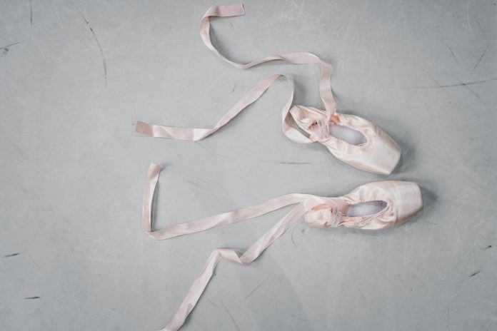 image-51 Light pink pointe shoes on floor