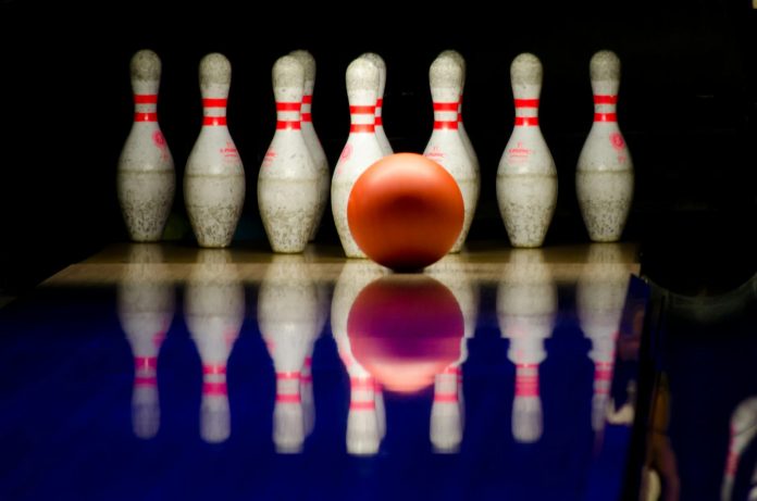 image-74 White Bowling Pins and Red Bowling Ball