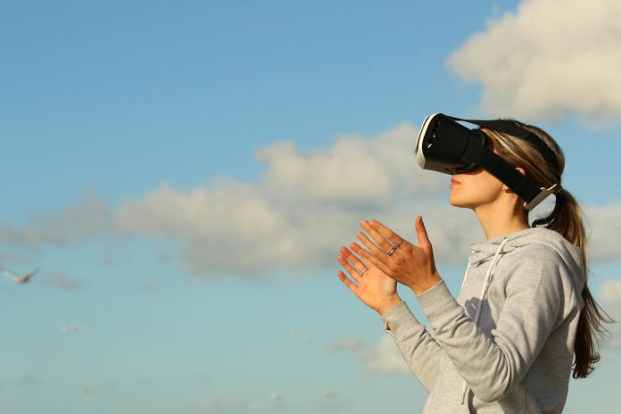 image-87 Woman Using Vr Goggles Outdoors