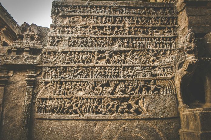 image-94 Carved pictures on stone wall of ancient temple