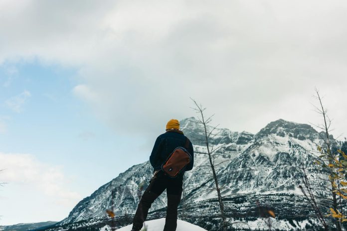 image-116 Back View of Man in Mountains in Winter