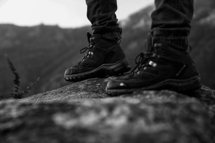 image-125 Monochrome Photo of Person Wearing Black Shoes
