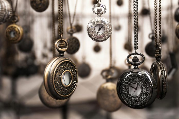 image-10 Assorted Silver-colored Pocket Watch Lot Selective Focus Photo
