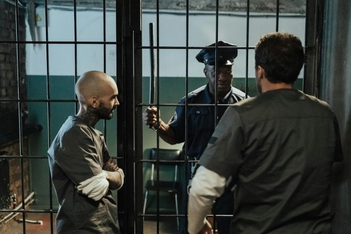 image-13 Policeman Talking with Prisoners
