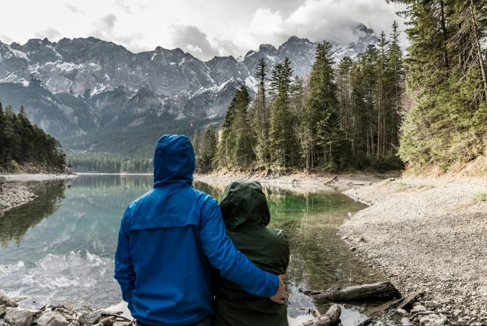 image-15 Couple Standing Near Body of Water